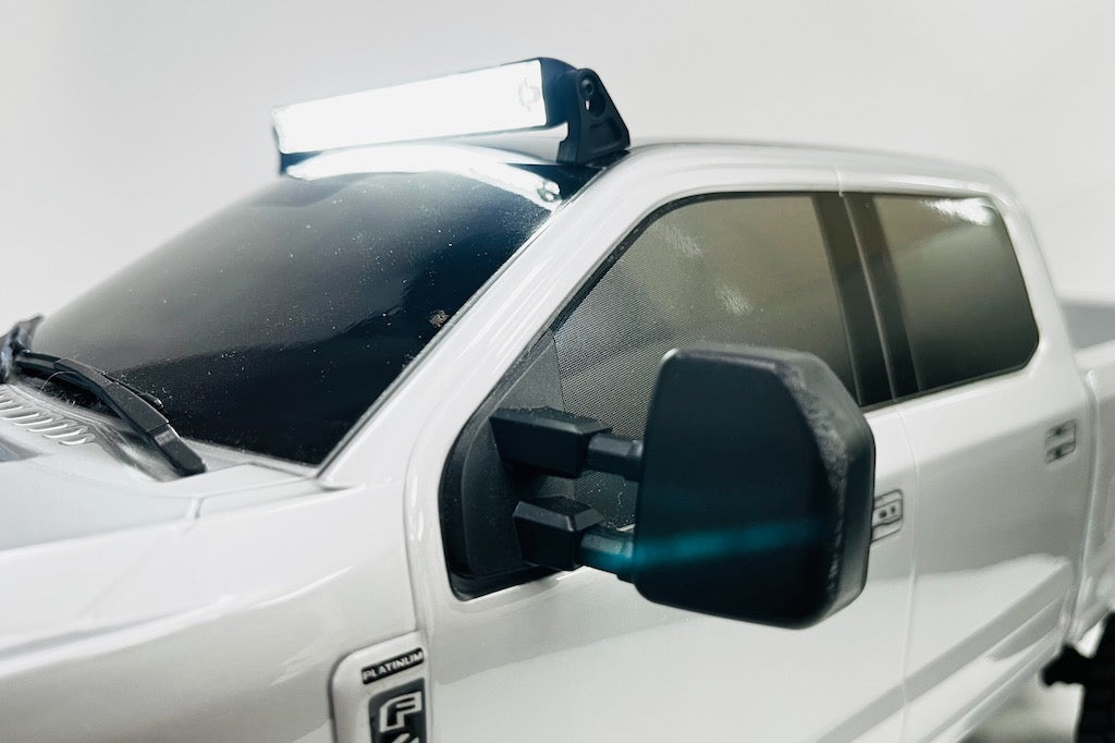 CEN Racing CKD0802 136mm LED light bar installed on DL-Series truck