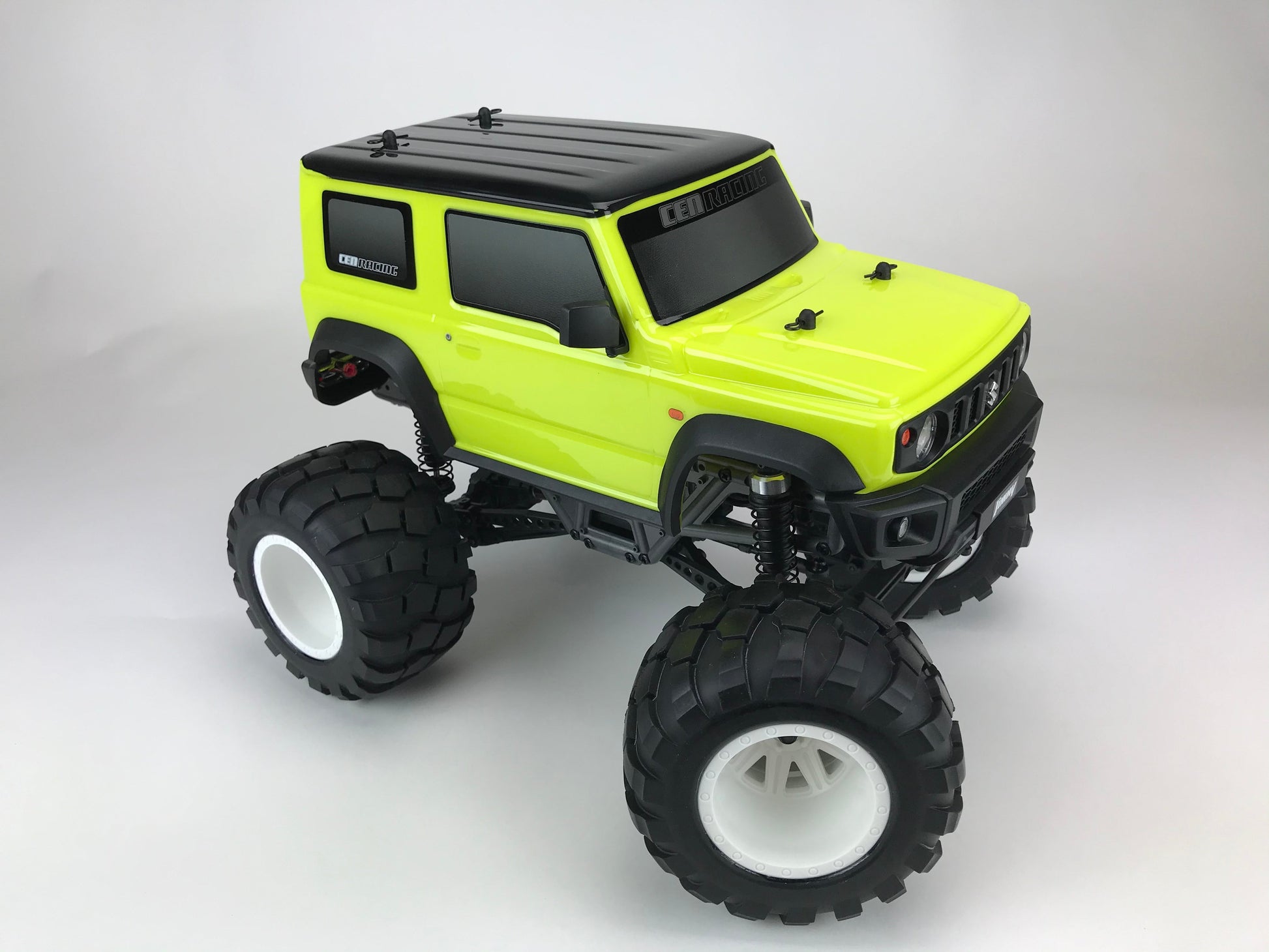 CEN 8936 Suzuki Jimny Yellow three-quarter view