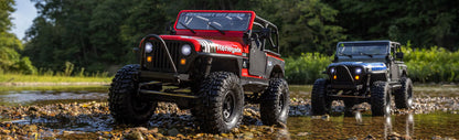 Axial SCX10 III Jeep CJ-7 Blue and Red crawlers on a trail