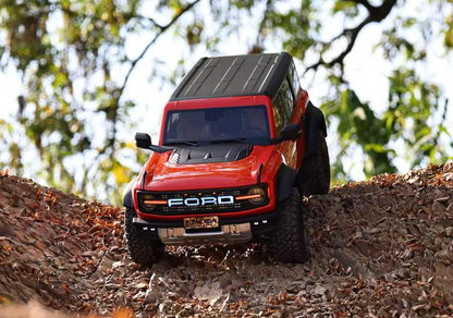 Traction Hobby Bronco Raptor orange climbing rocks