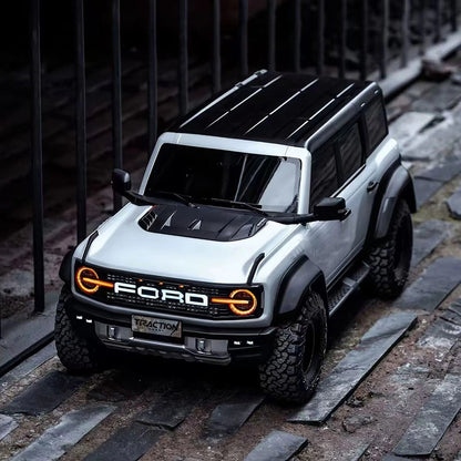 White Bronco Raptor illuminated outdoor front