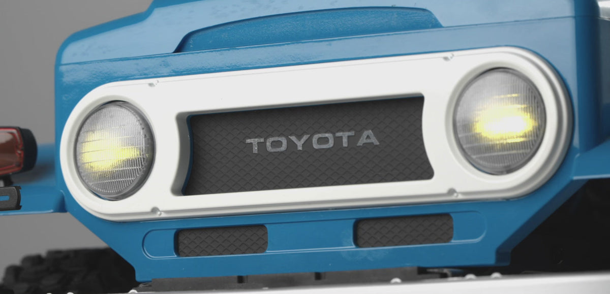 FMS Toyota Land Cruiser FJ40 official Toyota grille and front headlight detail