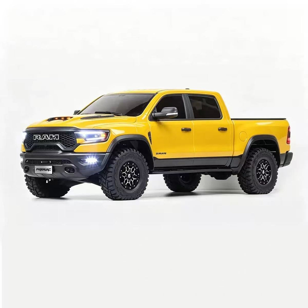 Yellow Traction Hobby RAM 1500 1/8 brushless RTR studio front three-quarter