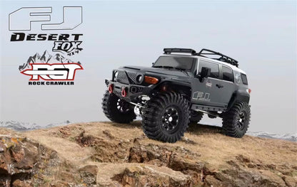 RGT EX86120 FJ Desert Fox black gray crawler on rocky trail