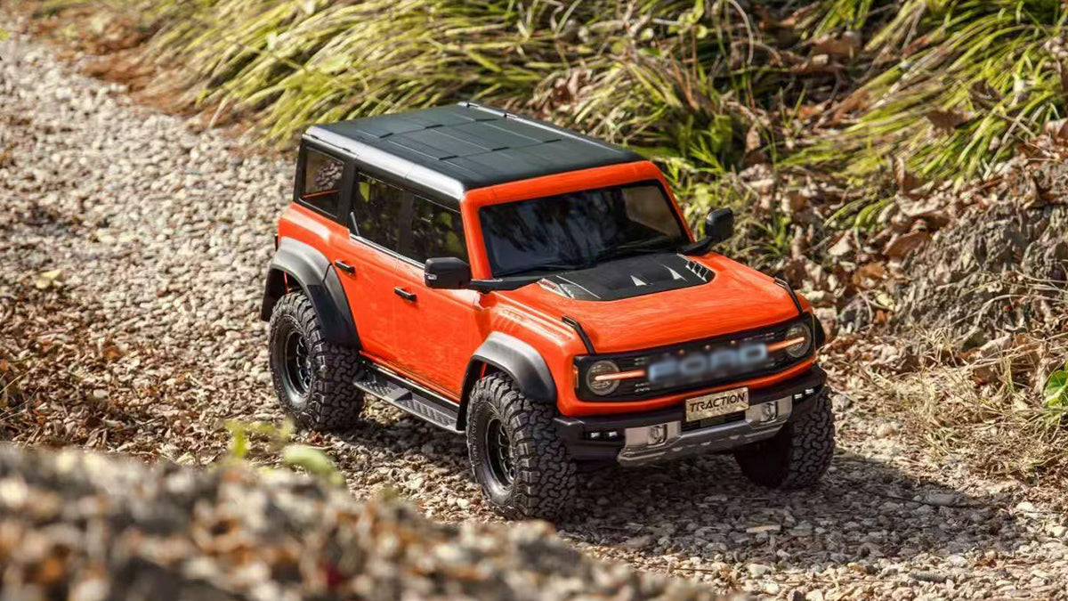 Traction Hobby Ford Bronco Raptor 1/8 orange front three-quarter view — reference photo of an out-of-stock color